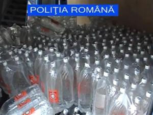 O întreagă reţea care vindea alcool de contrabandă, reţinută de poliţiştii clujeni. Prejudiciul cauzat este de 400.000 lei VIDEO