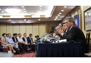 Ministrul Ioan Rus a invitat delegaţia României în China în camera sa de hotel la o slănină