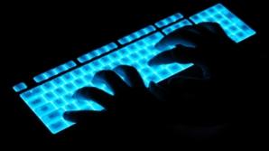 Doi hackeri care au spart site-urile IGPR şi a 20 de inspectorate de poliţie, prinşi de DIICOT 