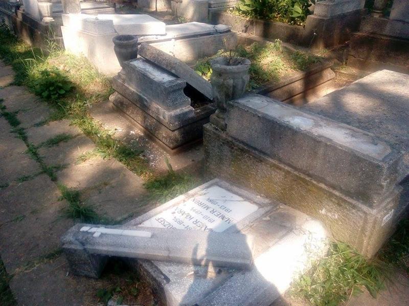 Tânăr din Dej reţinut pentru profanare de morminte şi furturi