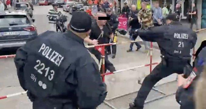 Scene șocante la Euro 2024! Polițiștii au împuşcat un bărbat care a atacat un grup de suporteri cu un târnăcop