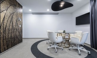 Angajații de la NTT DATA intră în bucătărie de pe tobogan. Cum arată noul sediu