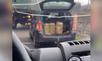 Furt de motorină din camioanele Armatei, într-o parcare din Cluj. ”Ia, băieți, cum se fură motorină din Armată!”