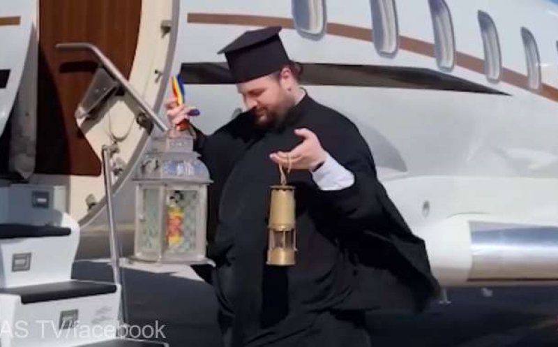 Lumina de la Sfântul Mormânt din Ierusalim a ajuns în ţară şi va fi împărţită parohiilor ortodoxe