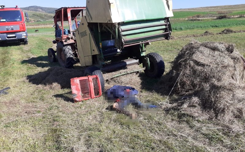 Accident teribil în Cluj: Tânăr, mort după ce a fost prins într-un utilaj de balotat