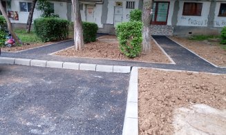 Asfalt pe repede înainte în Mănăştur pe aleile dintre blocuri, iar în locul garajelor demolate "răsar" locuri de parcare
