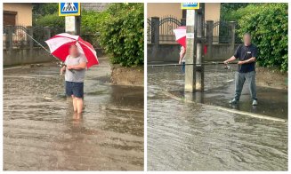 Haz de necaz în Turda. Oamenii au ieșit la „pescuit” pe o stradă inundată în urma ploilor
