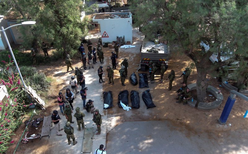 Hamas, CRUZIME fără limite: Cel puțin 40 de cadavre, inclusiv bebeluși decapitați, descoperite în Kfar Azzaz