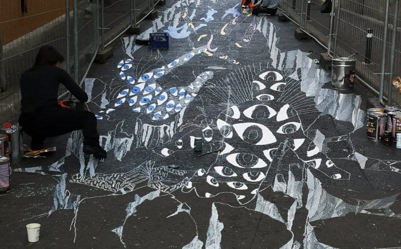 Pictura stradală 3D de pe Piezișă prinde contur în cadrul proiectului „Asphalt Art Initiative”