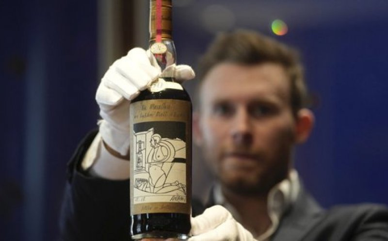 Cea mai scumpă sticlă de whisky din lume. A fost vândută la licitație pe o sumă uriașă