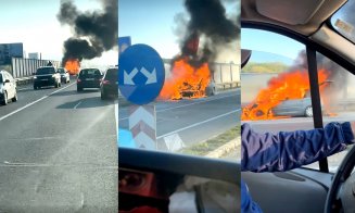 Maşină mistuită de flăcări pe centura Clujului / Şoferii trec pasivi mai departe...