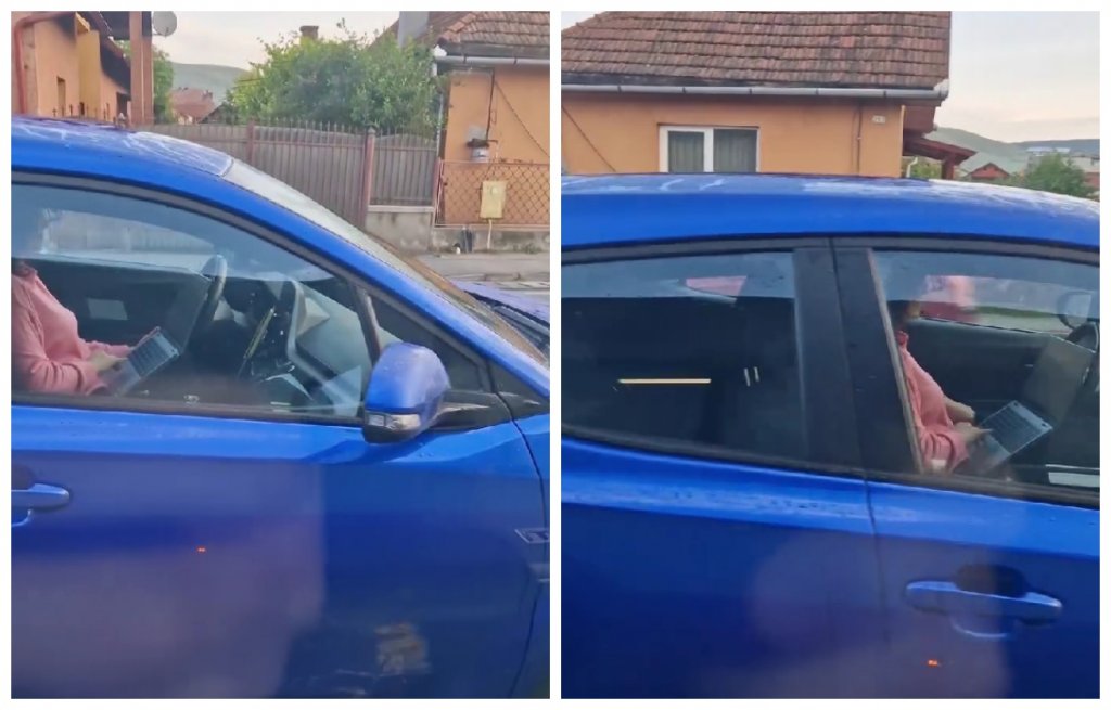 Șoferiță din Cluj, surprinsă în timp ce butonează laptopul la volan