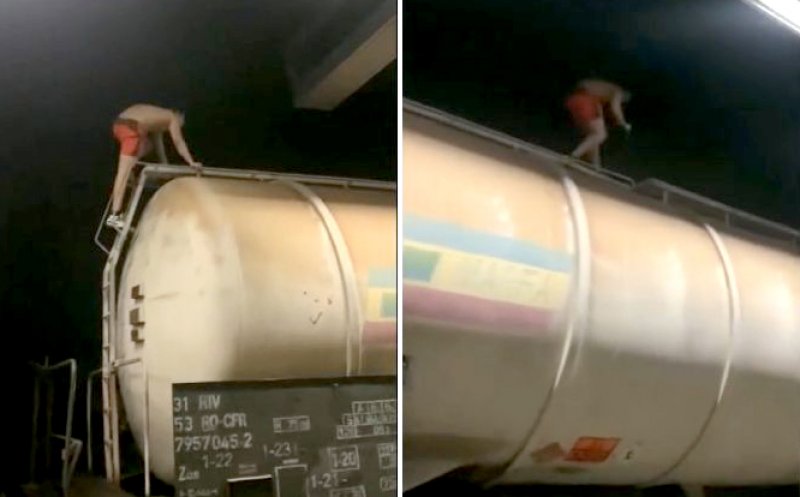 ŞOCANT: Tânăr filmat de prieteni şi postat online cum s-a urcat pe un vagon şi s-a electrocutat sub linia de înaltă tensiune la 27.000 de Volți