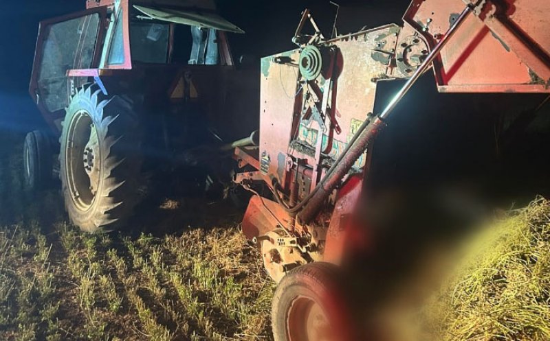 TRAGEDIE într-o localitate din Cluj. Bărbat strivit într-o balotieră / Medicii putut doar să mai declare decesul