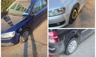 Val de distrugeri pe o stradă din Cluj-Napoca: mai multe mașini parcate pe trotuar, vandalizate
