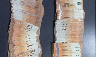 Traficanți de droguri, arestați la Cluj. Polițiștii au găsit la percheziții sume uriașe și cantități mari de stupefiante